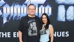 Andy Richter and Jennifer Herrera attend the premiere of "Spinal Tap II: The End Continues" at The Egyptian Theatre Hollywood on September 09, 2025