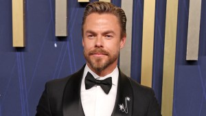 Derek Hough poses for photos at an event
