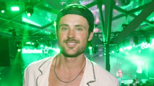 Dylan Efron smiling at an event