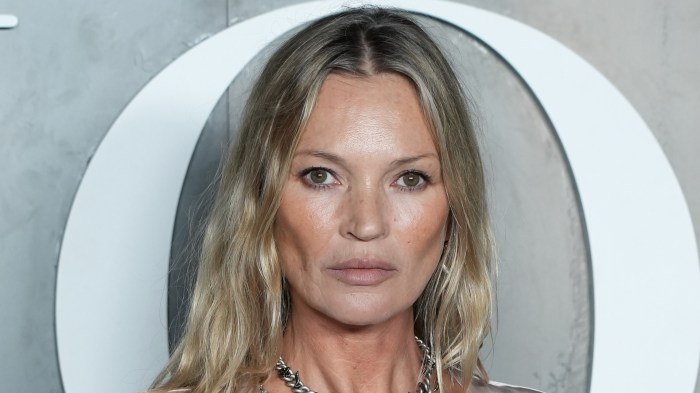 Kate Moss poses for photos at an event