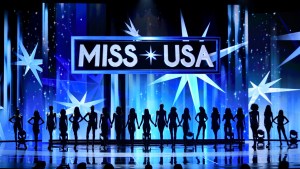 Miss USA 2025 signage and silhouette of women