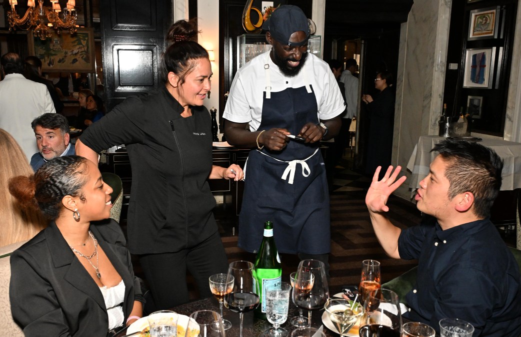 Chefs Antonia Lofaso and Eric Adjepong talk to guests a the Food Network New York City Wine &amp