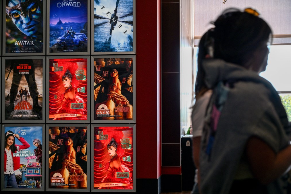 Fans walk by Swift posters as they arrive to "Taylor Swift: The Official Release Party of a Showgirl" at AMC Montgomery 16 movie theater in Bethesda, Maryland on October 3, 2025. To go alongside the 12-track album -- already the most streamed release of 2025 -- fans in dozens of countries are packing theaters for an accompanying film that is being released for three days only.
"Taylor Swift: The Official Release Party of a Showgirl" offers personal commentary from the singer as well as a first look at the video for the album's opening track, "The Fate of Ophelia." 