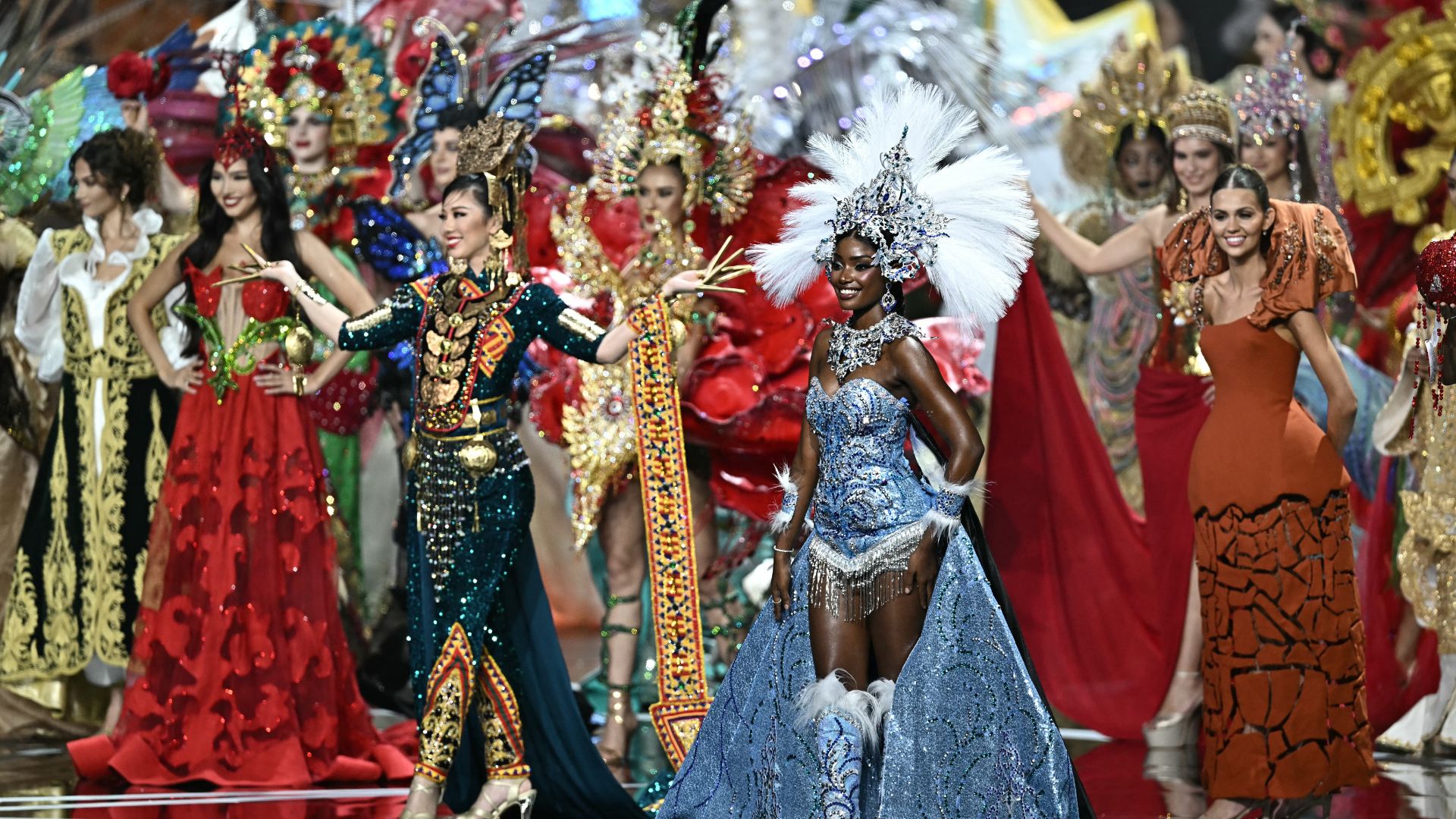 Miss Angola Maria Da Cunha (front R) walks on stage with other contestants during the 2025 Miss Universe national costume presentation in Nonthaburi, north of Bangkok, on November 19, 2025