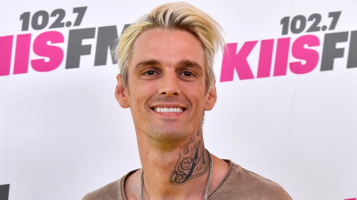Aaron Carter smiling at an event 