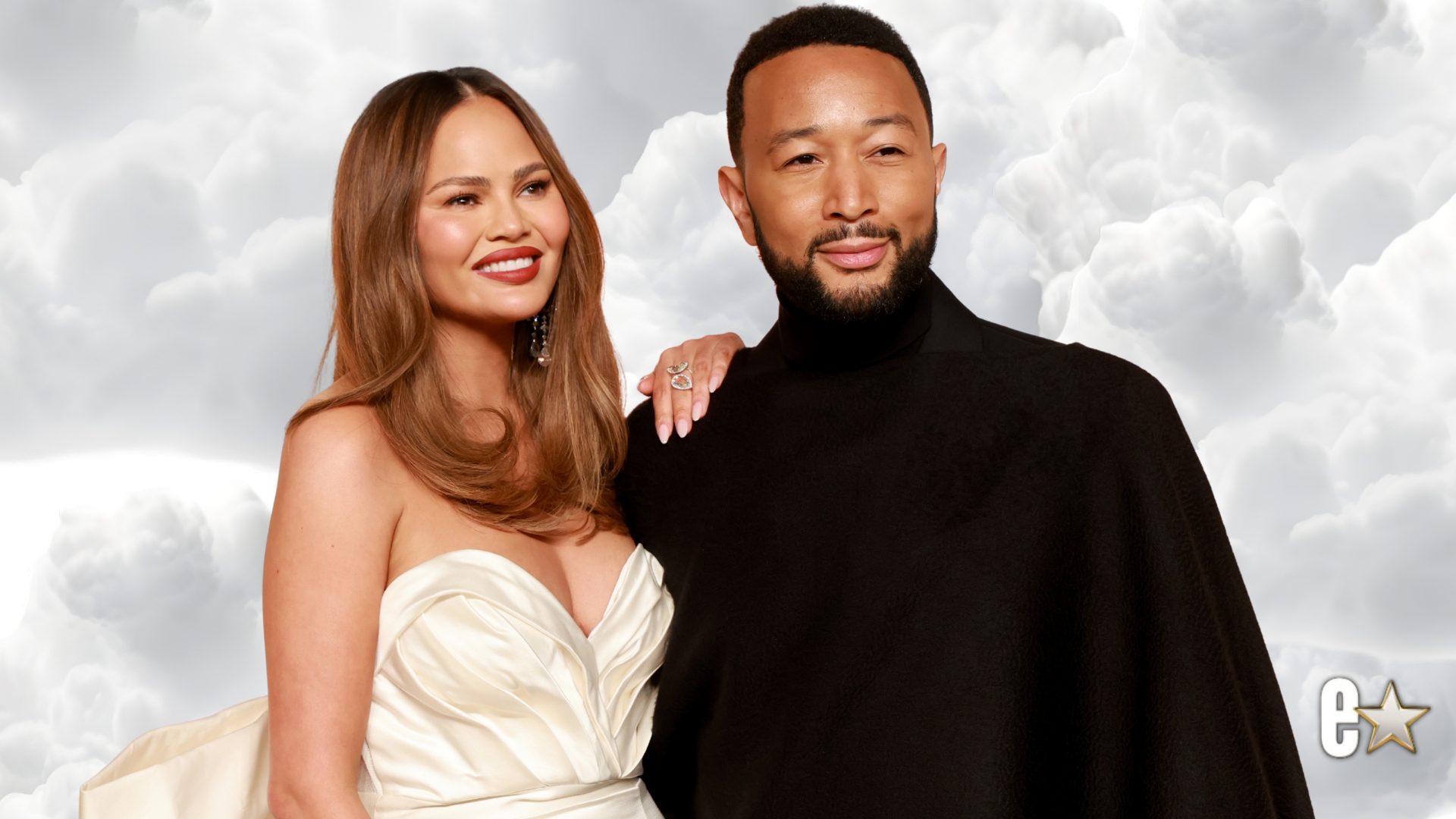 Chrissy Teigen and John Legend pose for a photo