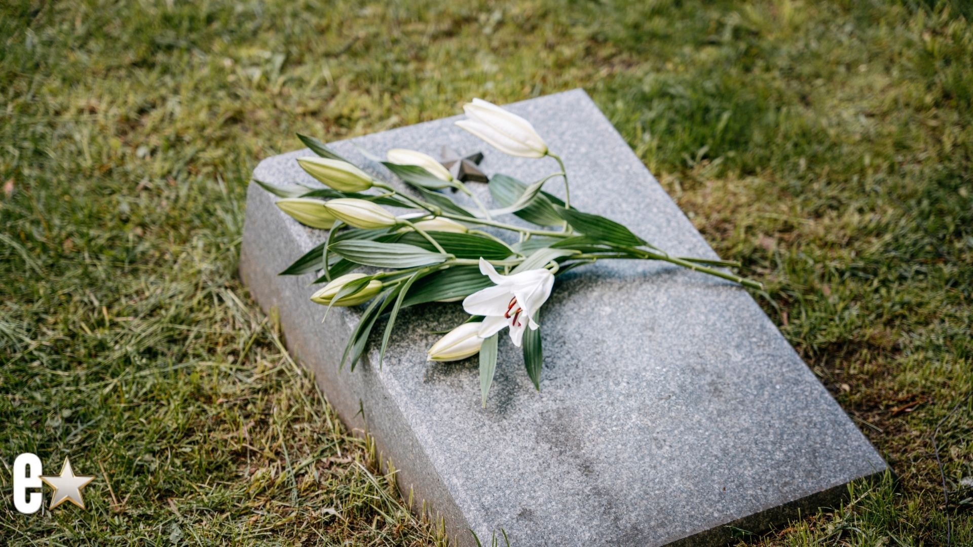 Grave stone with flowers