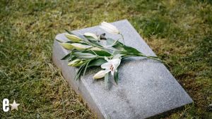 Grave stone with flowers
