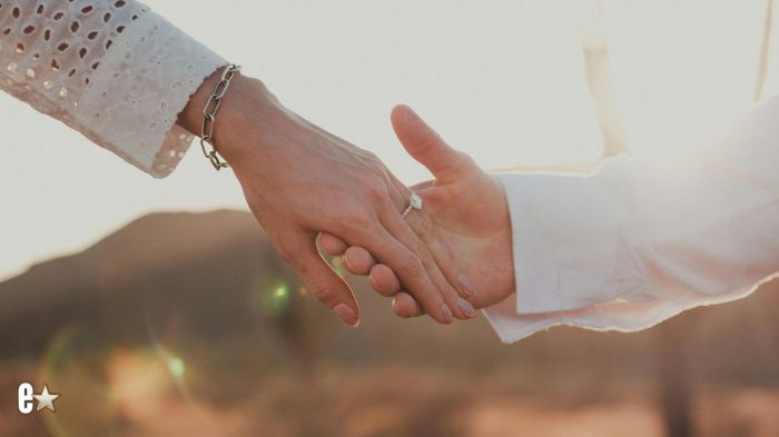 A couple holding hands
