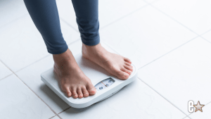 Woman standing on a scale