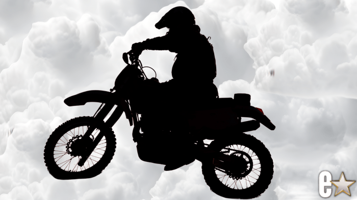 Motorcycle and rider in the clouds