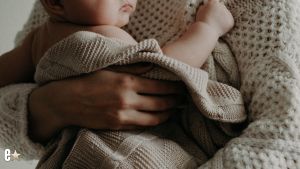 Mother holding her baby
