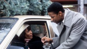 Whitney Houston and Denzel Washington in The Preacher's Wife (1996).