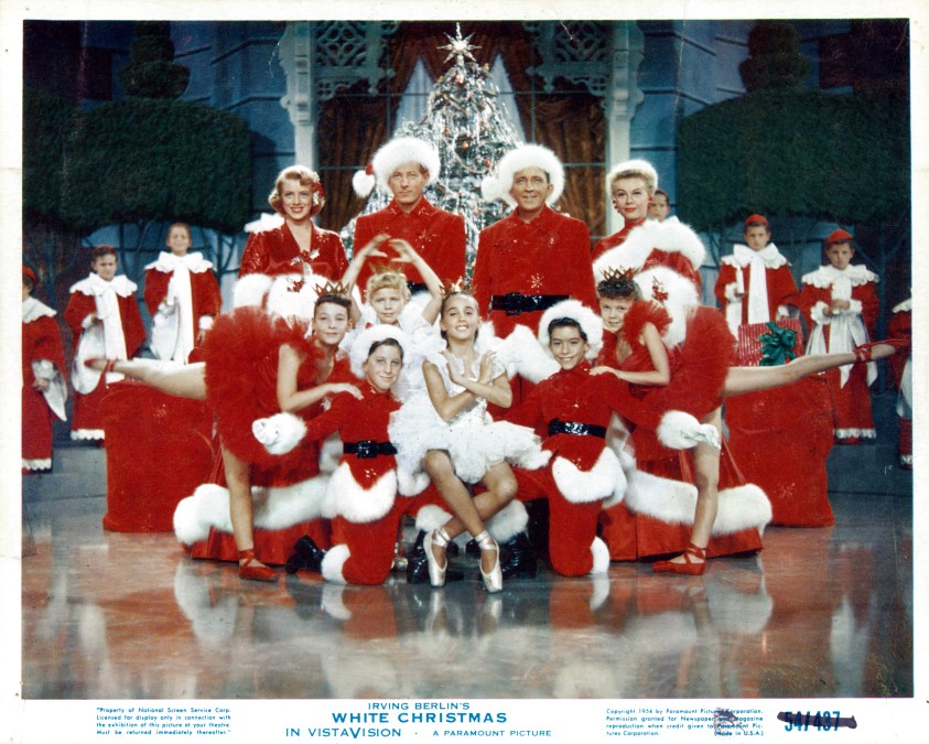 Rosemary Clooney, Danny Kaye, Bing Crosby, Vera-Ellen and children pose for picture in a scene from the film 'White Christmas', 1954. 