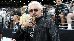 TV personality Guy Fieri is seen during a game between the Carolina Panthers and the Las Vegas Raiders