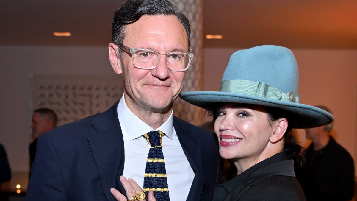 John Lambros and Karen Duffy.