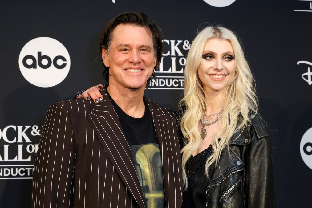 Jim Carrey and Taylor Momsen pose for photos in 2025