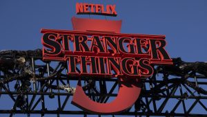 A sign above the main Fairfax stage is seen during the 'Netflix x CicLAviaMelrose Ave: Stranger Things 5 One Last Ride' down Melrose Avenue