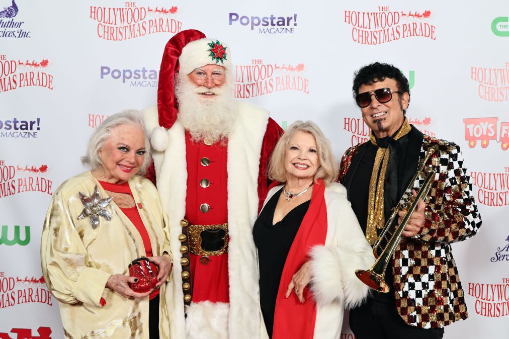 Carol Connors, Cortney Lofton dressed as Santa Claus, Kathy Garver and David Longoria attend the 93rd Annual Hollywood Christmas Parade with Grand Marshal Luke Wilson 