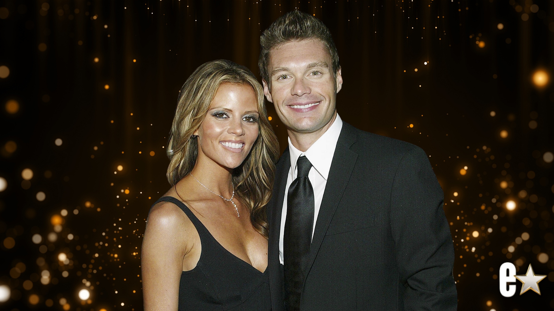 Ryan Seacrest and Shana Wall smiling at an event