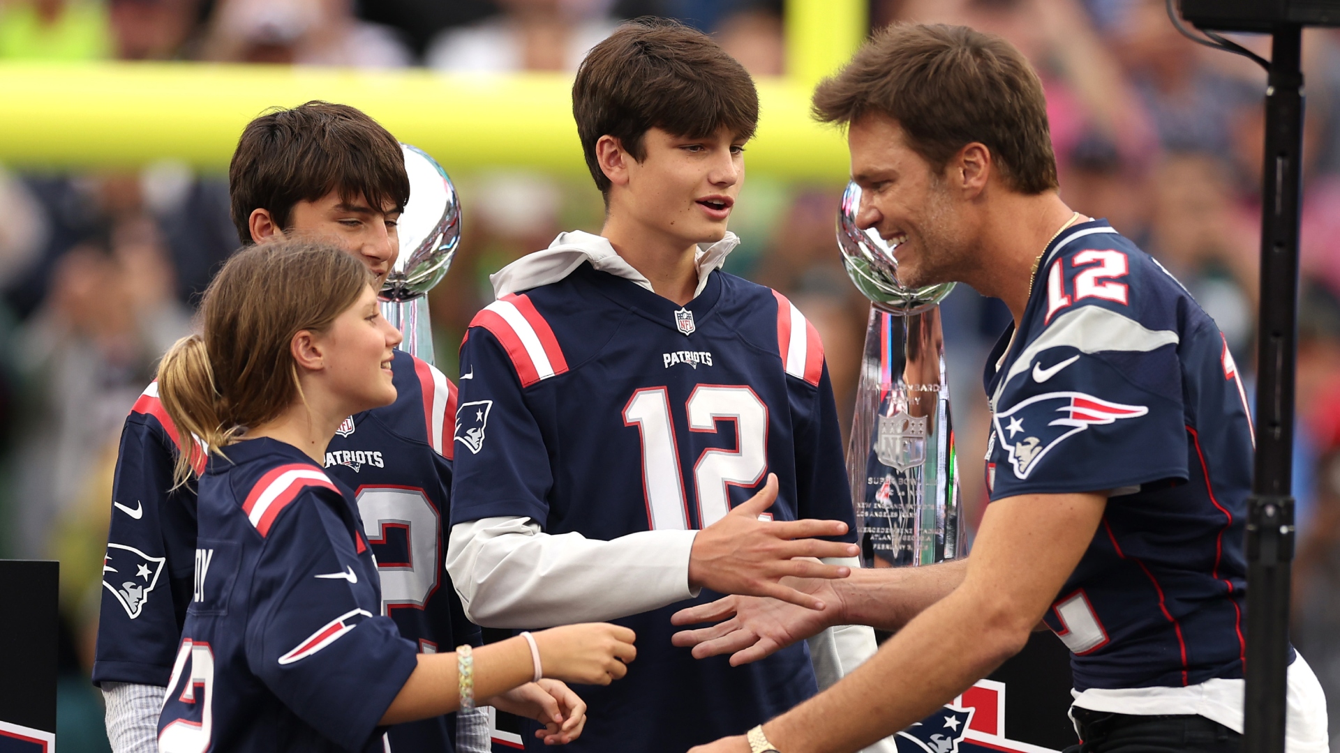 Tom Brady and his children at a sporting match
