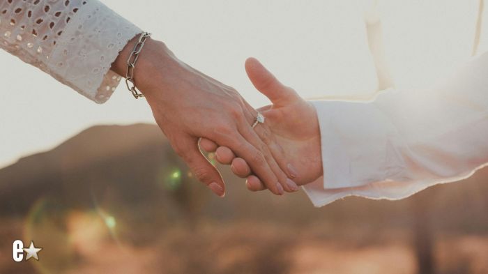 A couple holding hands
