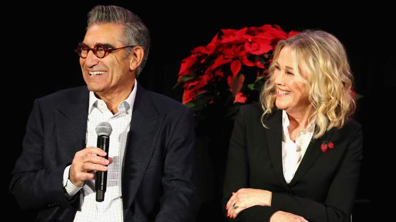 Eugene Levy and Catherine O'Hara smiling onstage