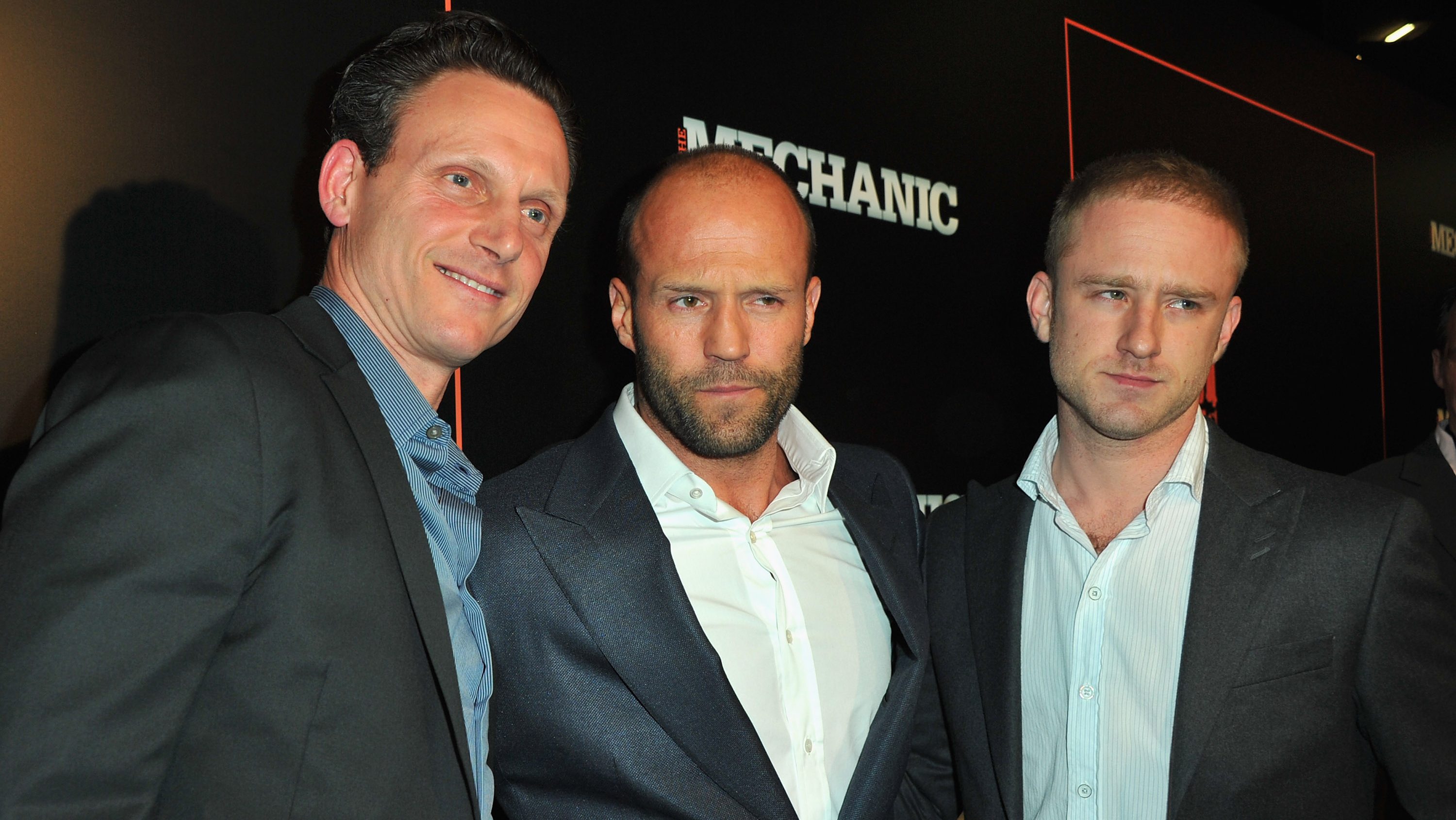 Tony Goldwyn, Jason Statham, and Ben Foster in 2011.