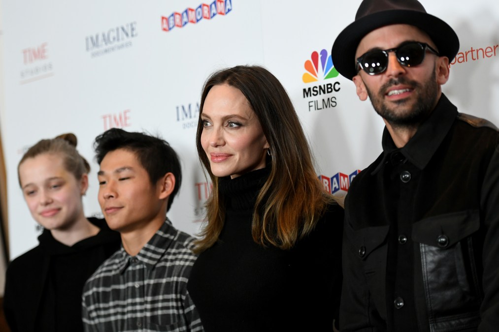 Shiloh Jolie-Pitt, street artist JR, actress Angelina Jolie and Pax Thien Jolie-Pitt