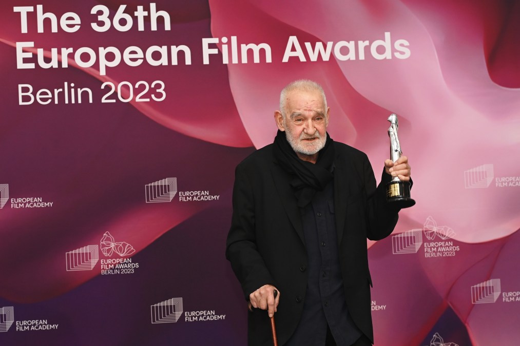 B&eacute;la Tarr holds his Honorary Award at the 36th European Film Awards in 2023