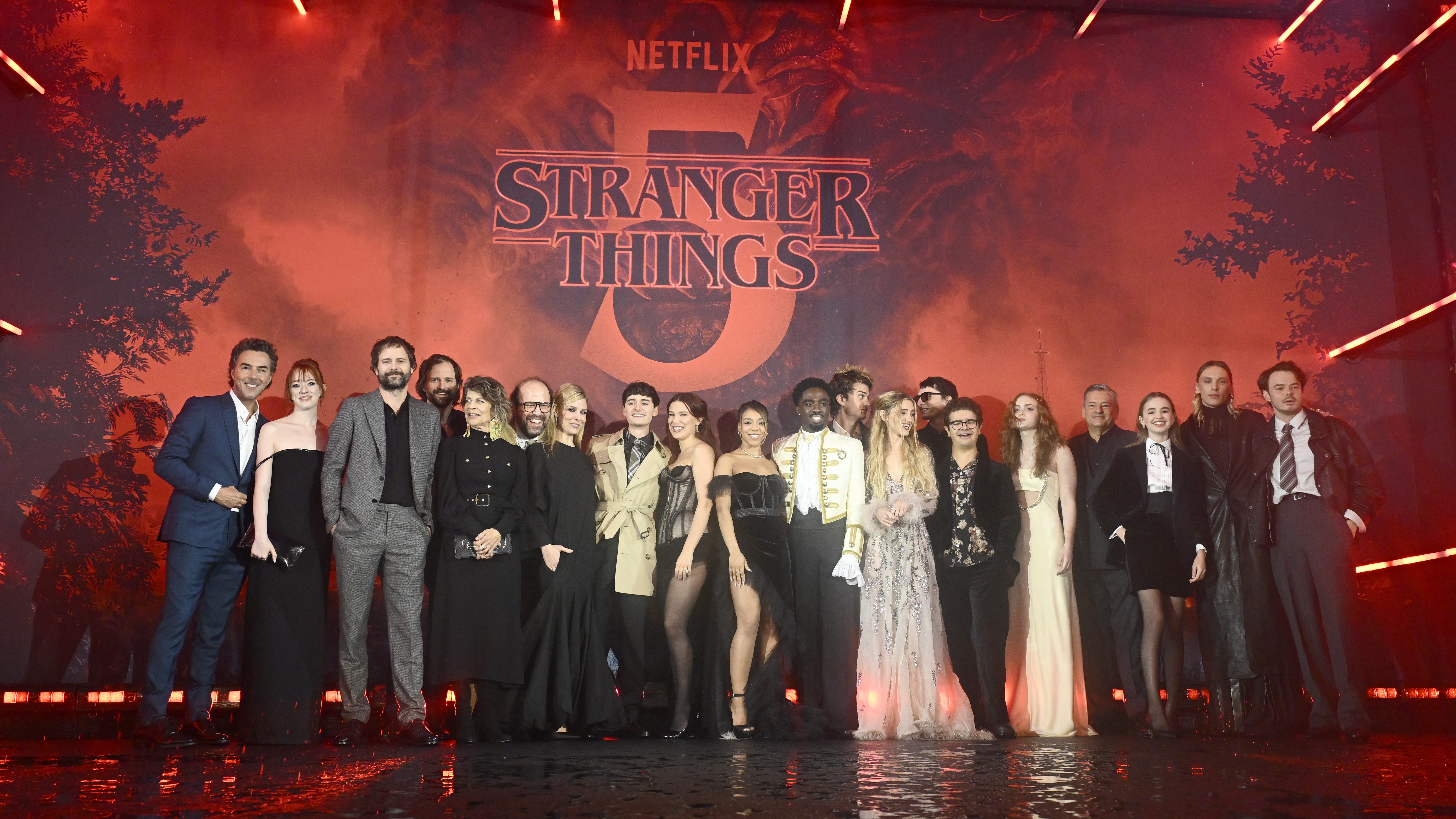 (L-R) Shawn Levy, Amybeth McNulty, Ross Duffer, Matt Duffer, Linda Hamilton, Brett Gelman, Cara Buono, Noah Schnapp, Millie Bobby Brown, Priah Ferguson, Caleb McLaughlin, Joe Keery, Natalia Dyer, Finn Wolfhard, Gaten Matarazzo, Sadie Sink, Ted Sarandos, Nell Fisher, Jamie Campbell Bower and Charlie Heaton attend the "Stranger Things 5" UK Special Screening