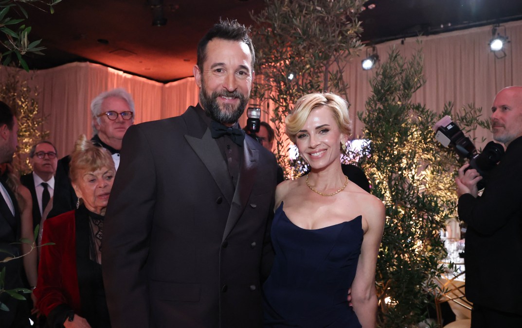 Noah Wyle and his wife, Sara Wells smiling