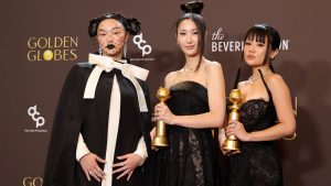 (L-R) Audrey Nuna, EJAE and Rei Ami, winners of the Best Original Song - Motion Picture for "Golden" from "KPop Demon Hunters," pose in the press room during the 83rd Annual Golden Globe Awards
