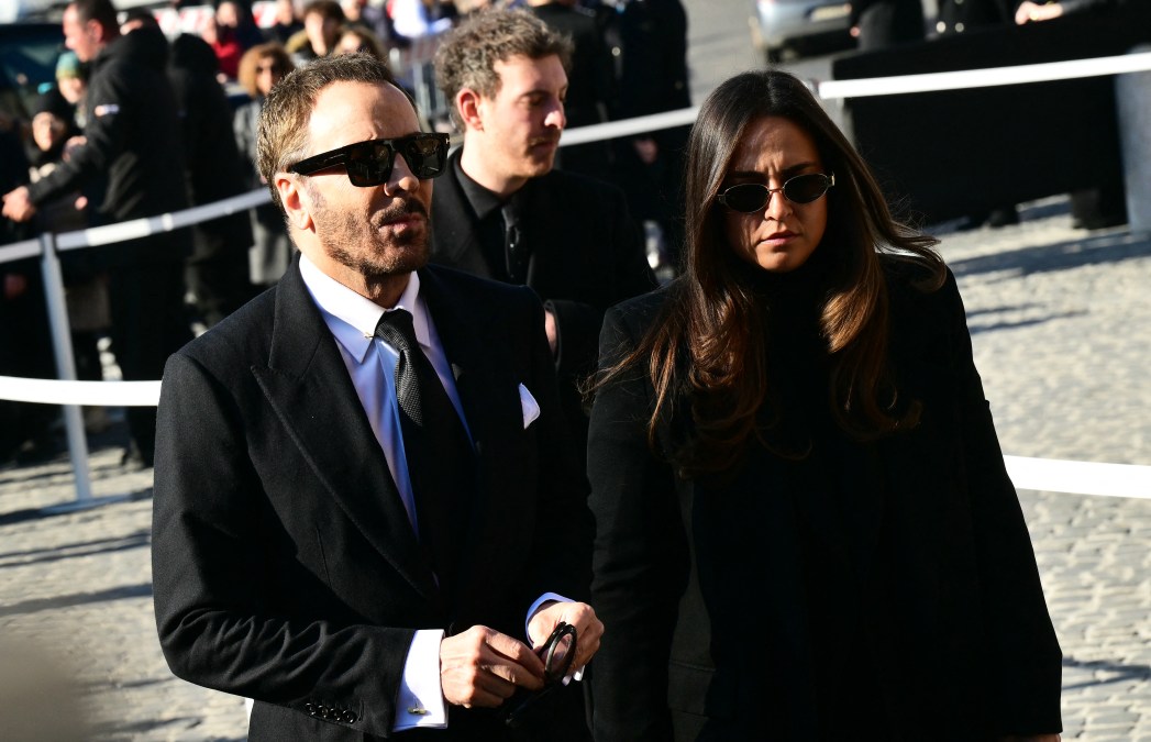 US fashion designer Tom Ford (L) arrives at the funeral ceremony for the late Italian fashion designer Valentino Gavarani