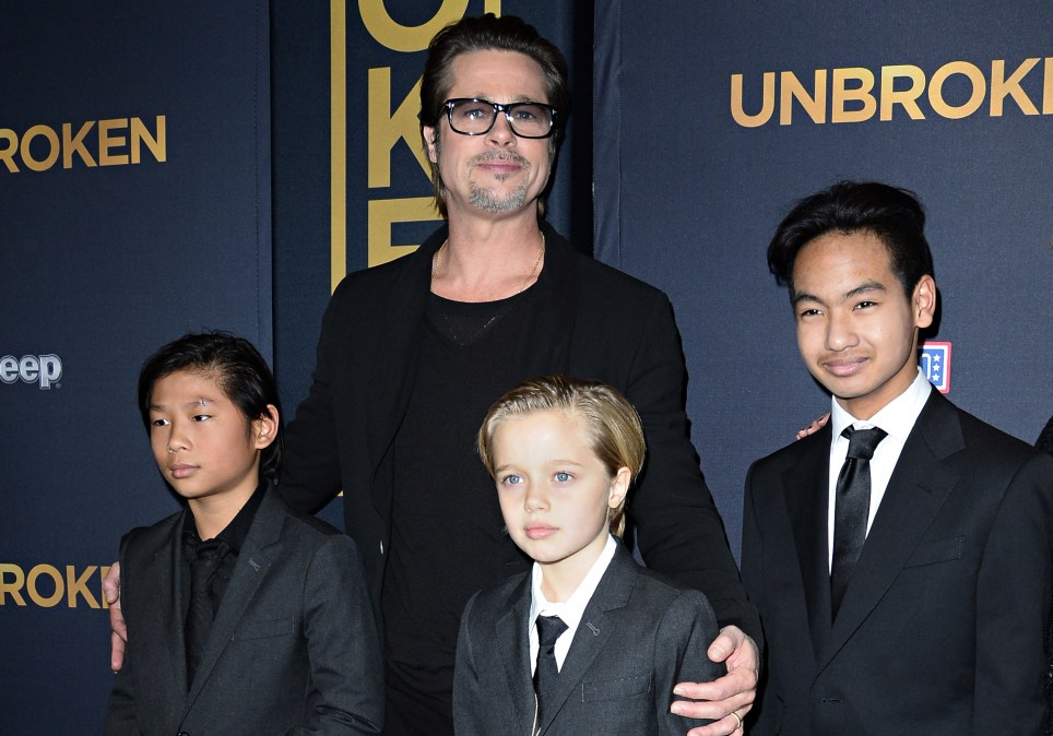 Actor Brad Pitt and children Pax Jolie-Pitt (L), Shiloh Jolie-Pitt (C) and Maddox Jolie-Pitt