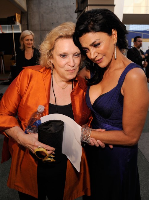 Nancy Seltzer holds actress Shohreh Aghdashloo