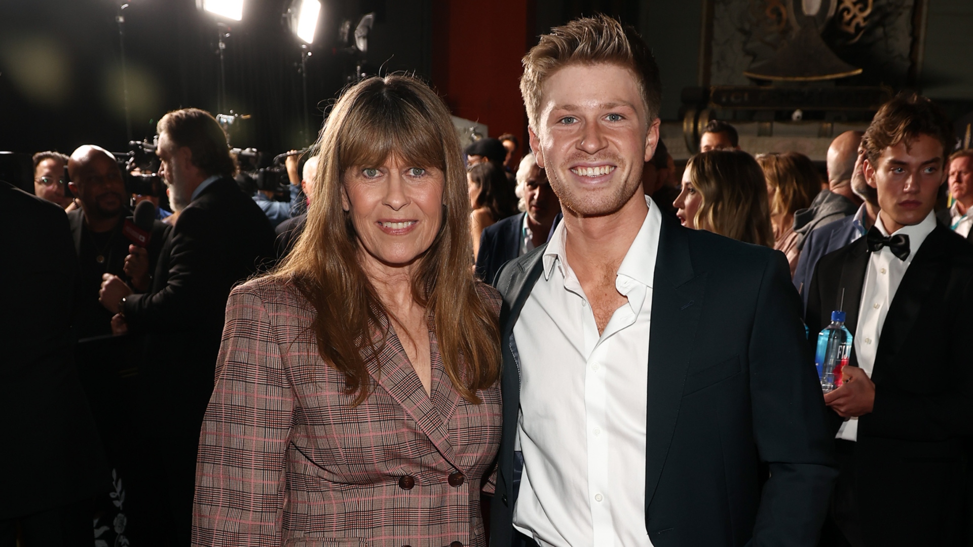 Terri Irwin and Robert Irwin smiling at an event