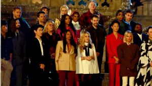 THE TRAITORS -- "Let the Cards Fall as they Will" Episode 401 -- Pictured: (l-r) Rob Rausch, Mark Ballas, Colton Underwood, Eric Nam, Stephen Colletti, Lisa Rinna, Donna Kelce, Dorinda Medley, Porsha Williams, Natalie Anderson, Candiace Dillard Bassett, Tara Lipinski, Michael Rapaport, Rob Cesternino, Kristen Kish, Monét X Change, Ian Terry, Caroline Stanbury, Ron Funches, Johnny Weir