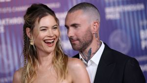 Behati Prinsloo (L) and US singer Adam Levine arrive at the Tenth Breakthrough Prize Ceremony at the Academy Museum of Motion Pictures in Los Angeles, California, on April 13, 2024