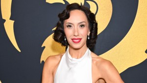 Cheryl Burke smiles for photos at an event
