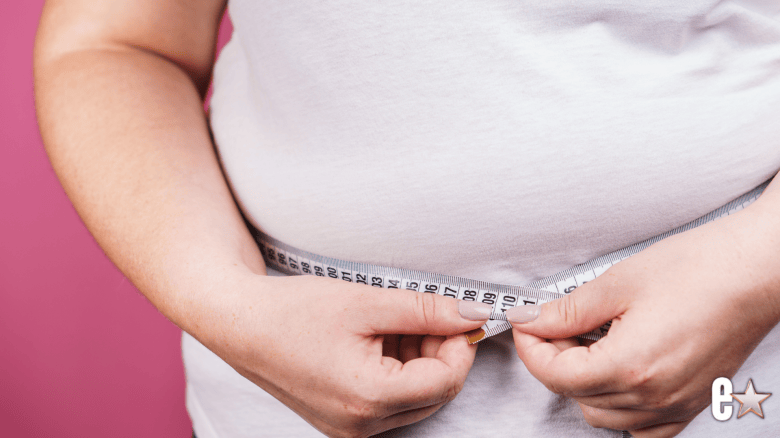 photo showing a woman with a tape measure