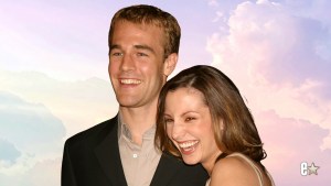 James Van Der Beek and Heather McComb smiling at an event