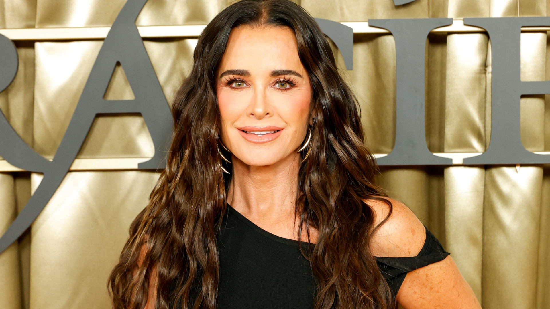 Kyle Richards smiles at an event