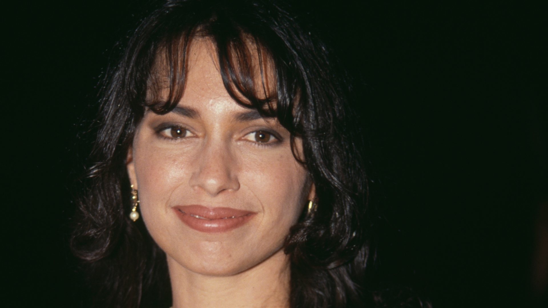 Susanna Hoffs, smiling, in the '90s