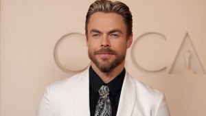 Derek Hough poses for photos at the 2026 Oscars