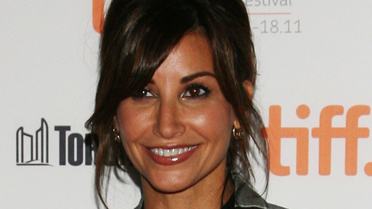 Gina Gershon attending an event