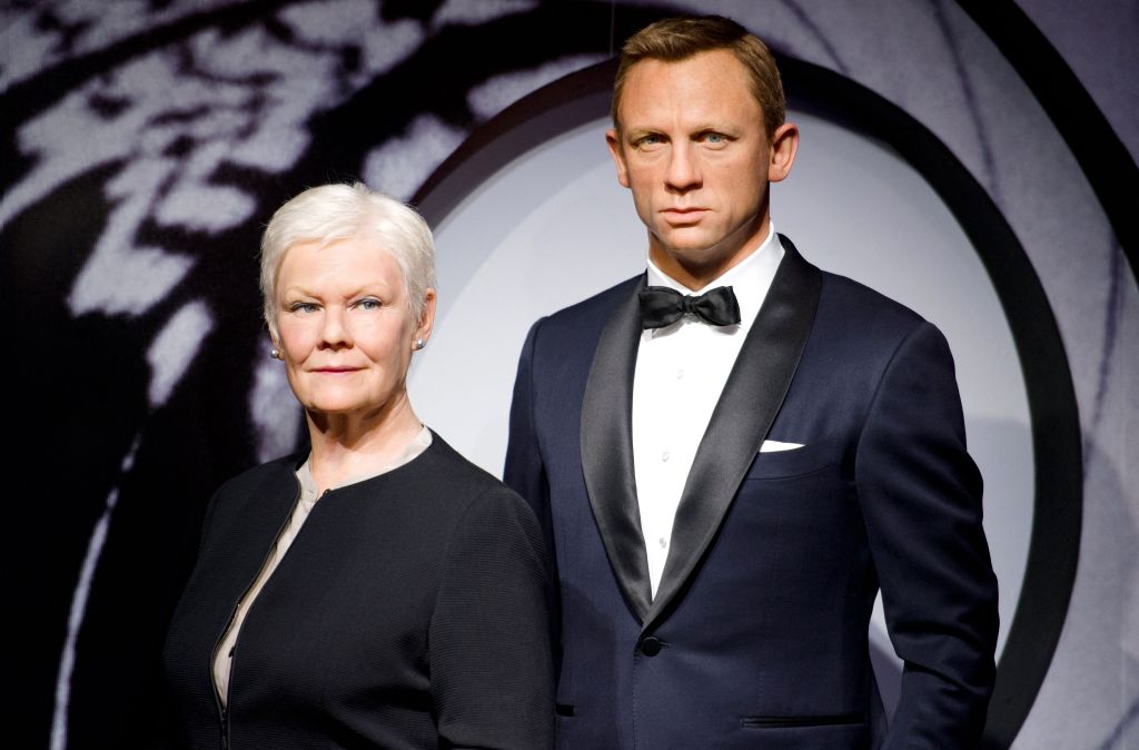 Waxworks of Dame Judi Dench and James Bond co-star Daniel Craig.