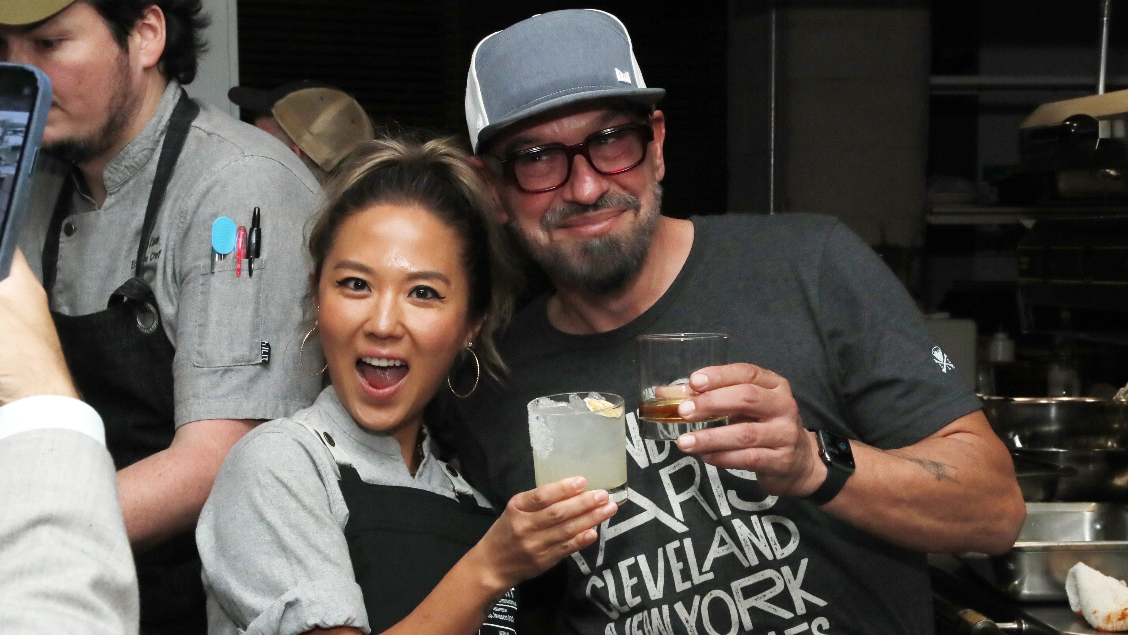 '24 In 24' hosts Esther Choi and Michael Symon.