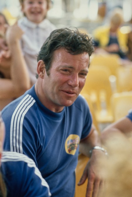 Canadian actor William Shatner, wearing a blue t-shirt with white trim, attends the 'US Against the World II,' an all-star athletic competition in Los Angeles, California