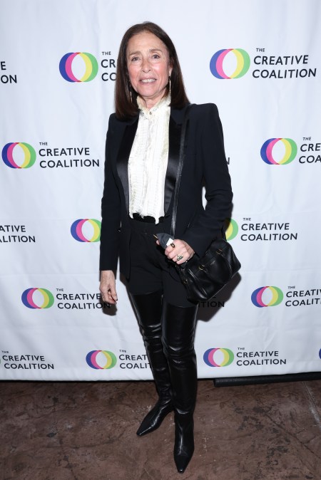 Mimi Rogers smiles at an event